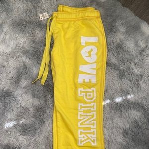 PINK yellow crop sweats